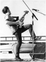 Mark Mortimer playing live at the Tamworth Rock Festival with Bash Out The Odd in July 1990.